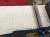 Máquina automática de tombamento de assinaturas para papéis de capa dura